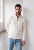 Camisero Lucca Giive con textura geométrica, cuello alto, cierre de cremallera y manga larga.
