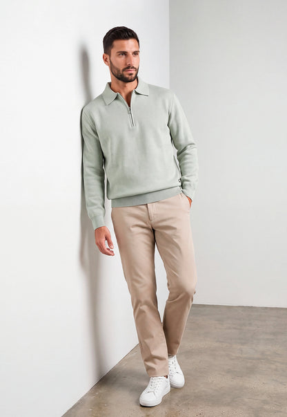 Camisero Nexo Giive verde tejido con cuello camisero, cierre frontal de cremallera y manga larga.