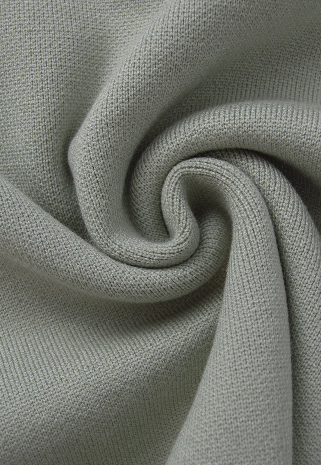 Camisero Nexo Giive verde tejido con cuello camisero, cierre frontal de cremallera y manga larga.